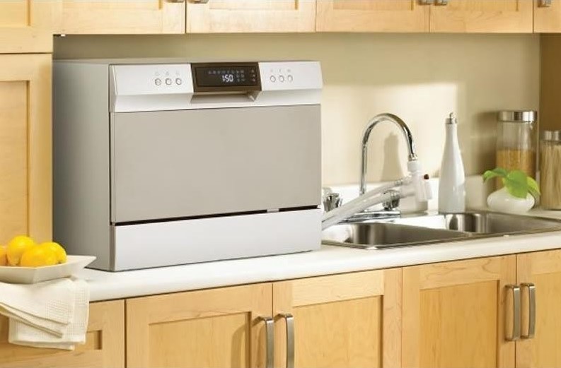 lone Danby countertop dishwasher in clean kitchen