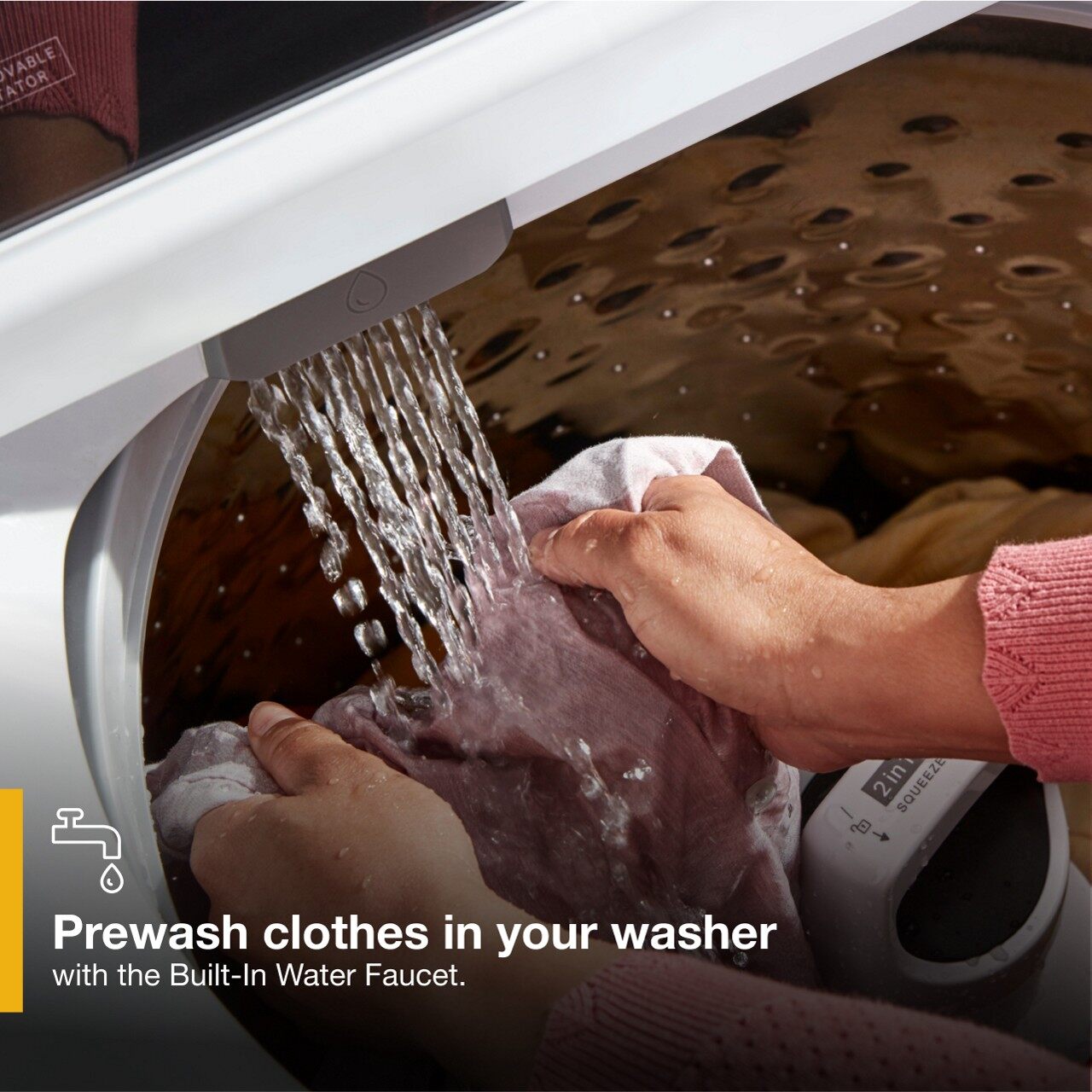 Woman using the built-in faucet feature on the Whirlpool WTW5057LW top load washer 