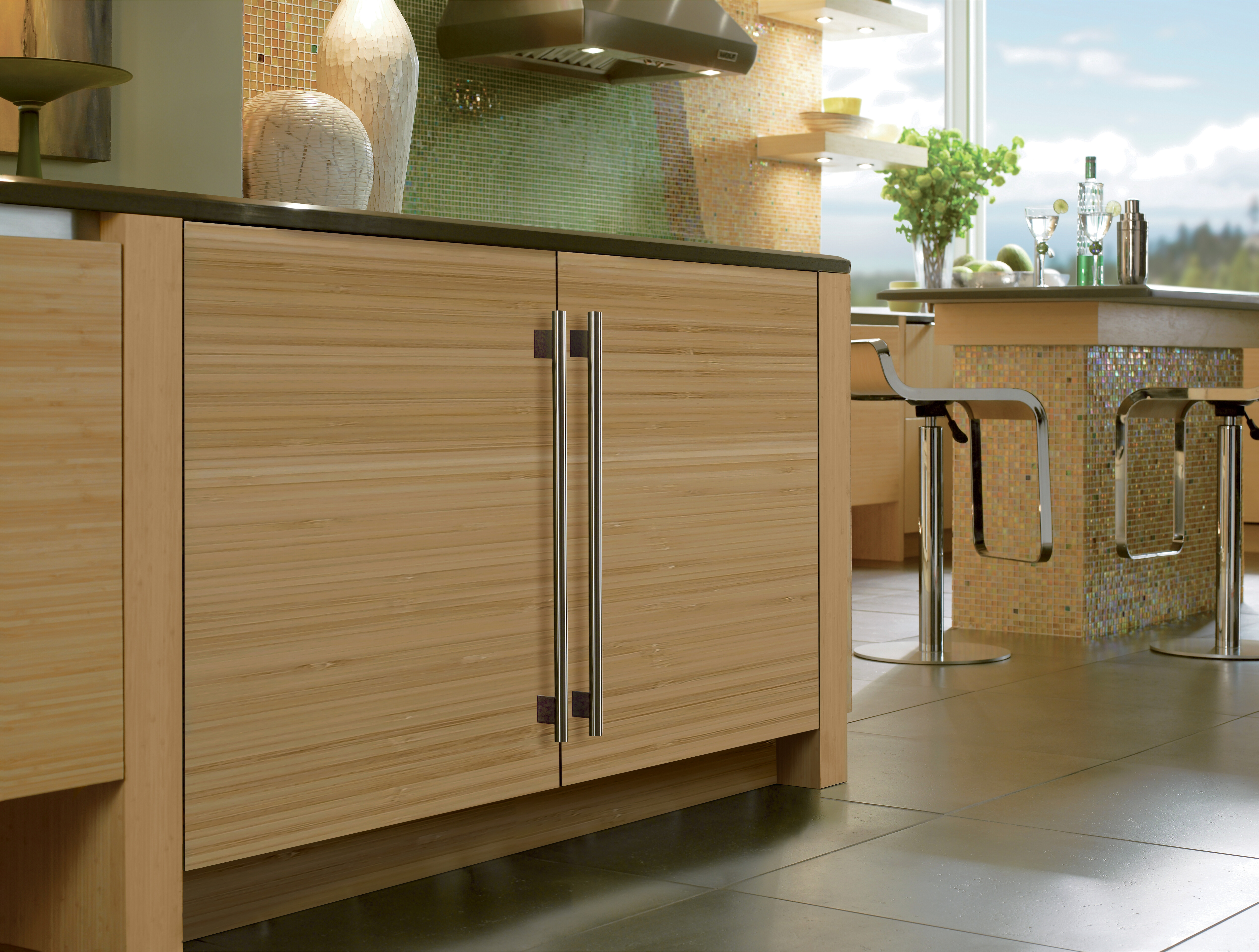 A matching Sub-Zero undercounter freezer and refrigerator with custom panel fronts 
