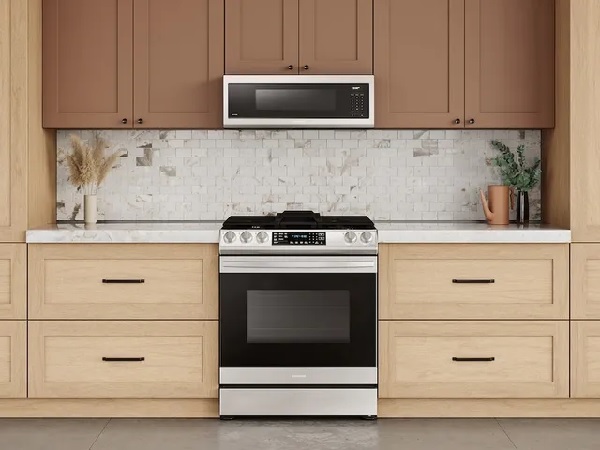 The Samsung ME11A7710DS over the range microwave with a matching range 