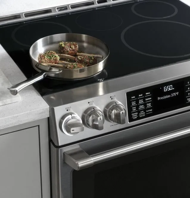 Lamb chops cooking on the Café CHS90XP2MS1 induction range 