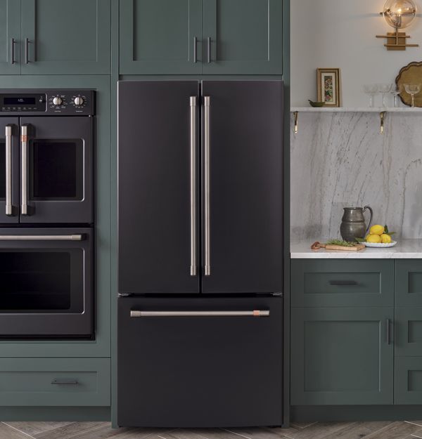 A matte black Café refrigerator in a kitchen
