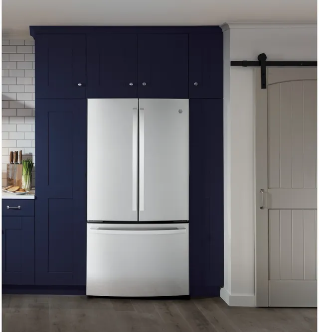 The GE GWE23GYNFS French door refrigerator in a kitchen with blue walls 