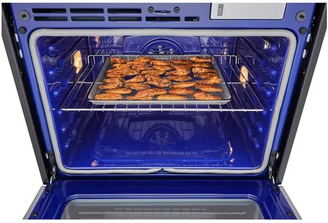 Chicken wings baking inside the LG WSEP4727F air fry oven 