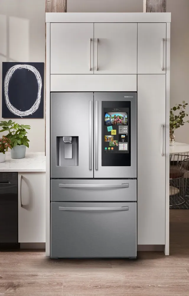 A Samsung RF22R7551SR French door refrigerator shown in a kitchen 