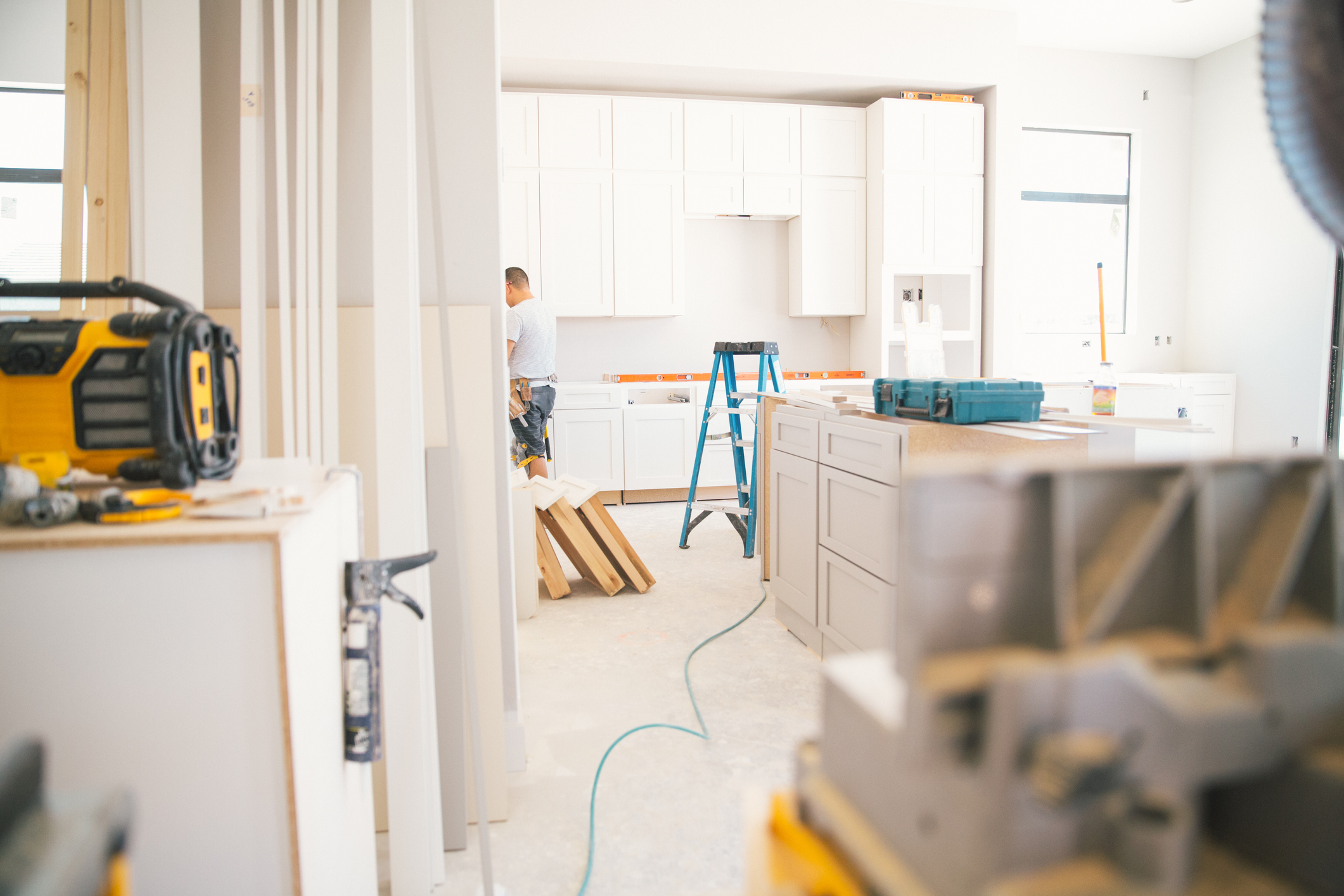 man working on a kitchen remodel 