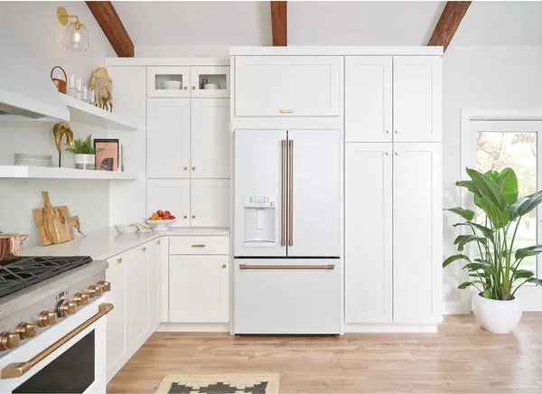 A kitchen featuring Café matte white appliances 