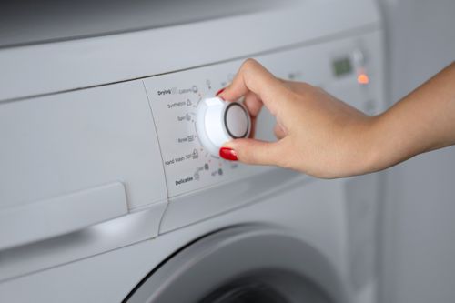 Turning Dial on Dryer