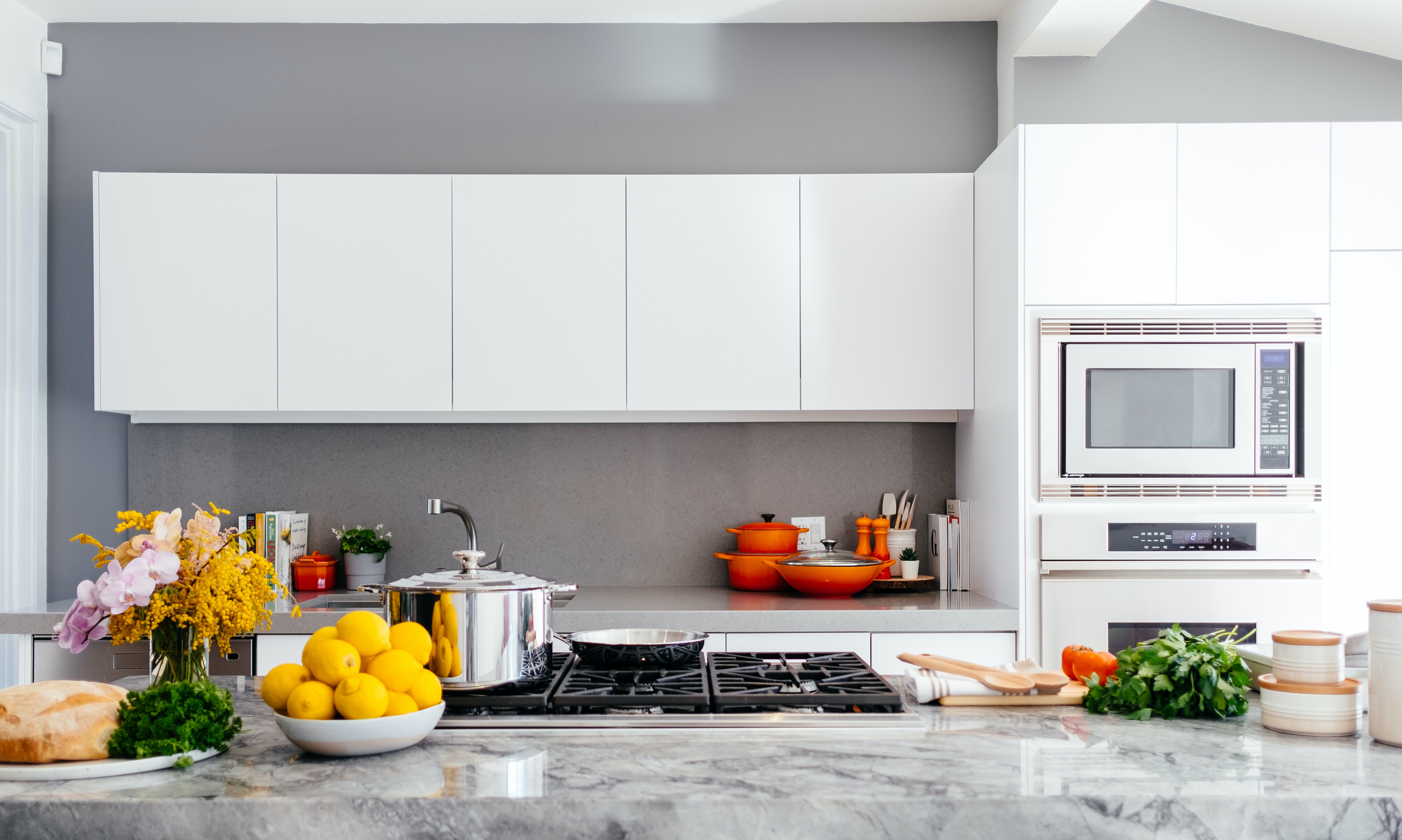 White microwave in white kitchen 