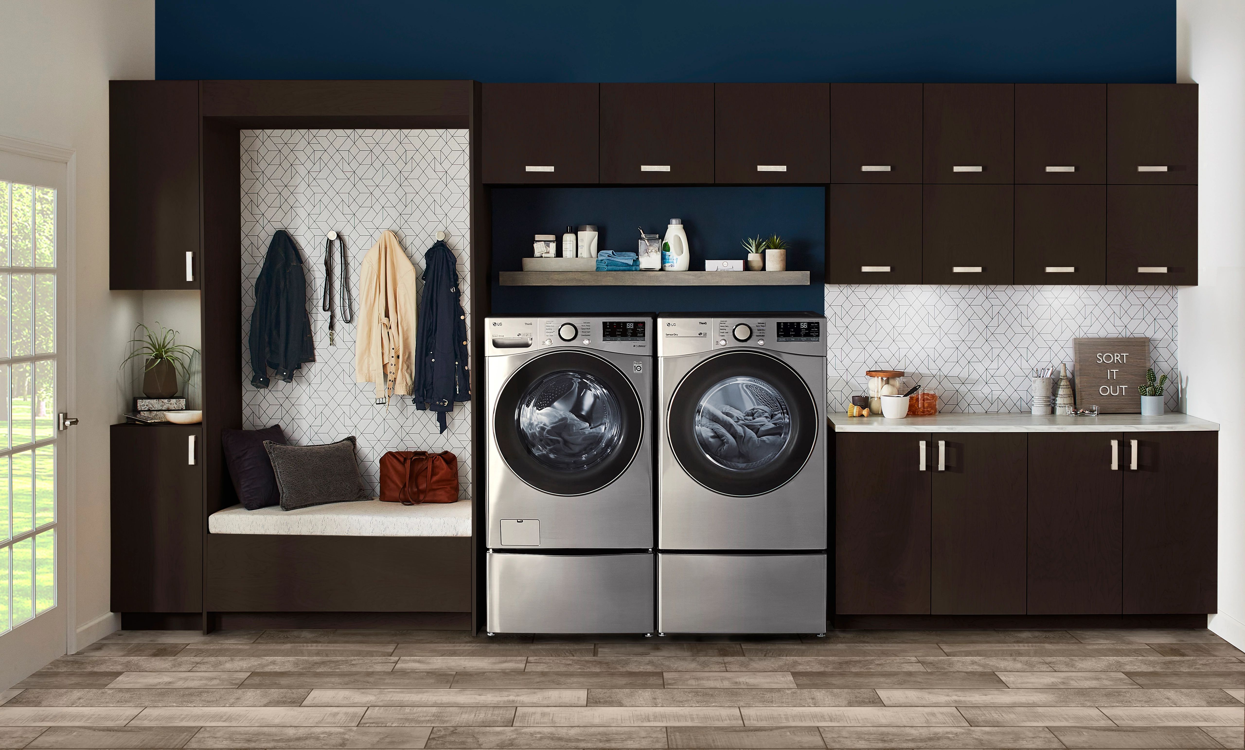 Front view of LG front load washer and dryer in a modern laundry room 