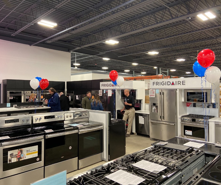 : A variety of stoves and fridges at an East Coast Appliance showroom 