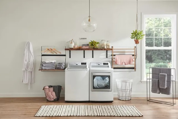 A modern laundry room featuring the LG WT7800CW washer and matching dryer 