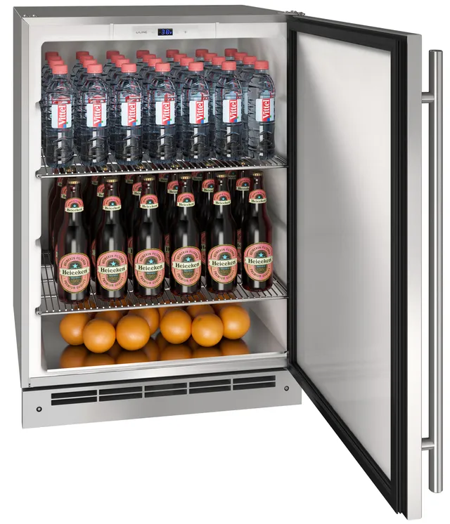 The U-Line UOKR124-SS01A 24” kegerator shown with bottles and oranges inside 