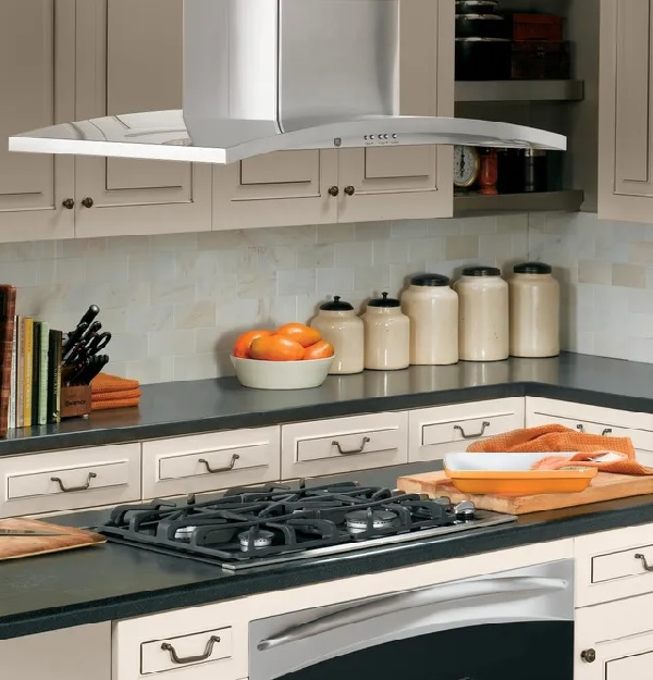 The GE Profile PV977NSS island range hood featured in a kitchen 