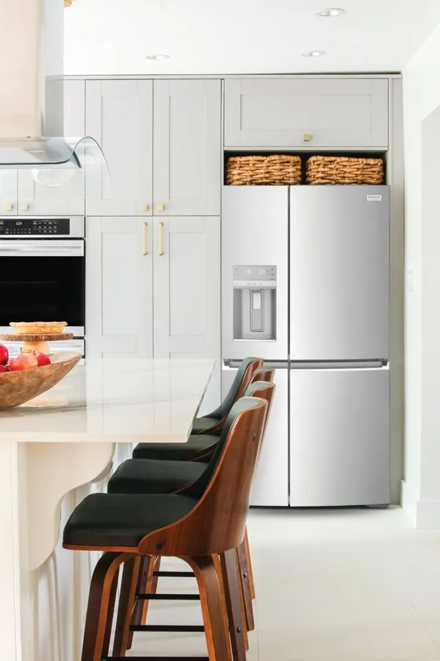 The Frigidaire Gallery GRQC2255BF French door refrigerator shown in a kitchen 