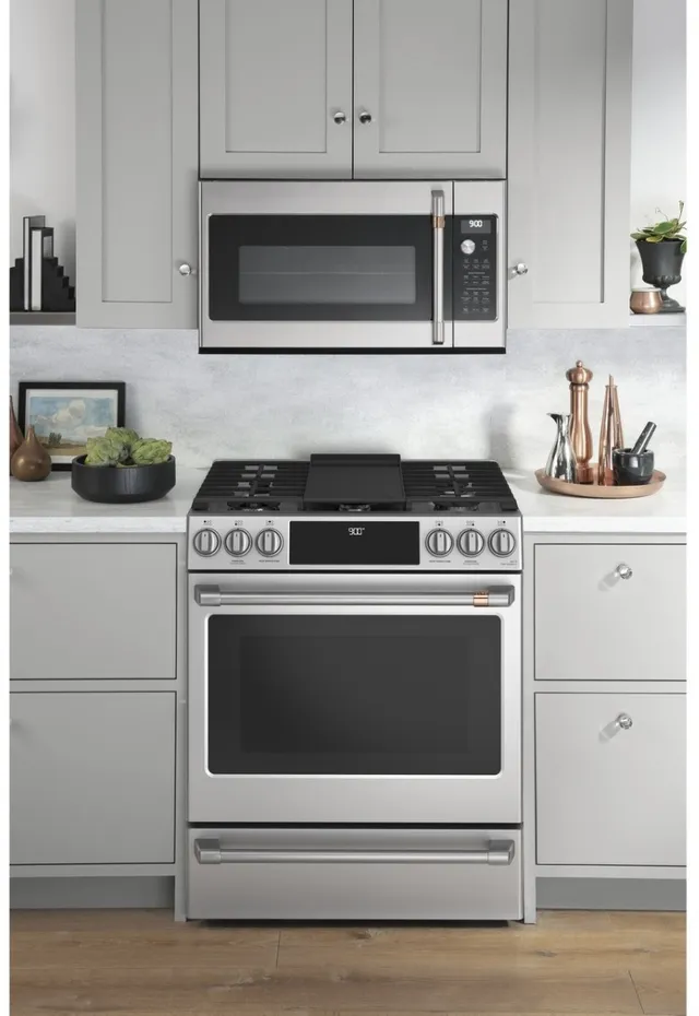 The GE Café C2S900P2MS1 30-inch dual fuel range shown with a matching over-the-range microwave 