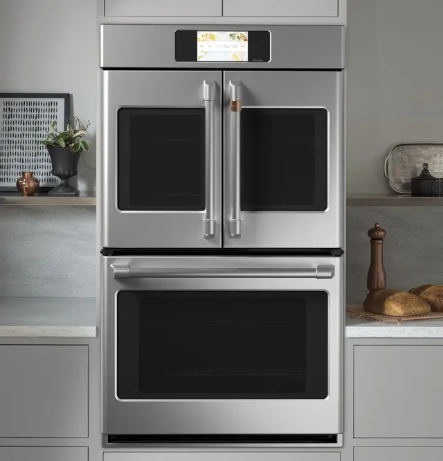 The GE Café CTD90FP2NS1 French door double wall oven shown installed in a kitchen 