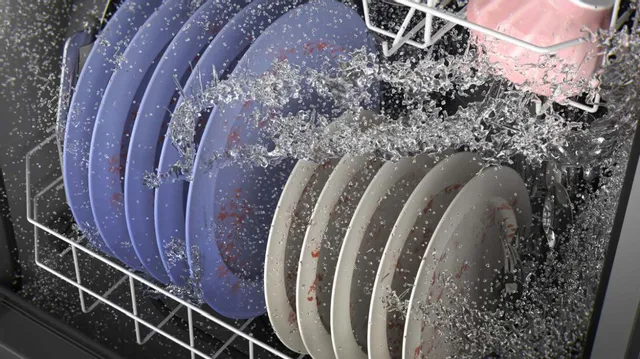 Dishes washing in the GE GDT550PYRFS dishwasher