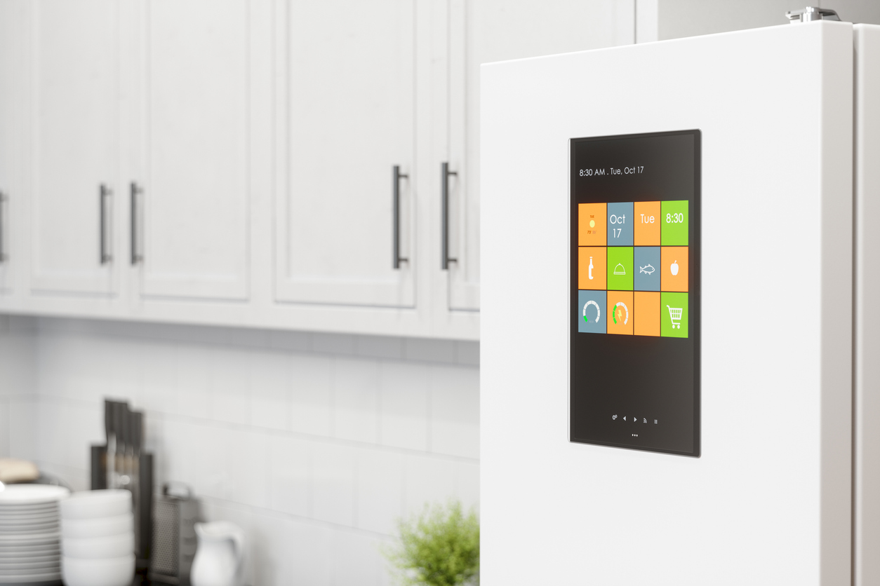 white refrigerator with simulated touchscreen on the door