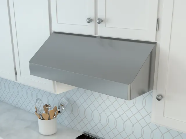 The Zephyr Tempest AK7042CS 42” under cabinet hood installed over a cooktop 
