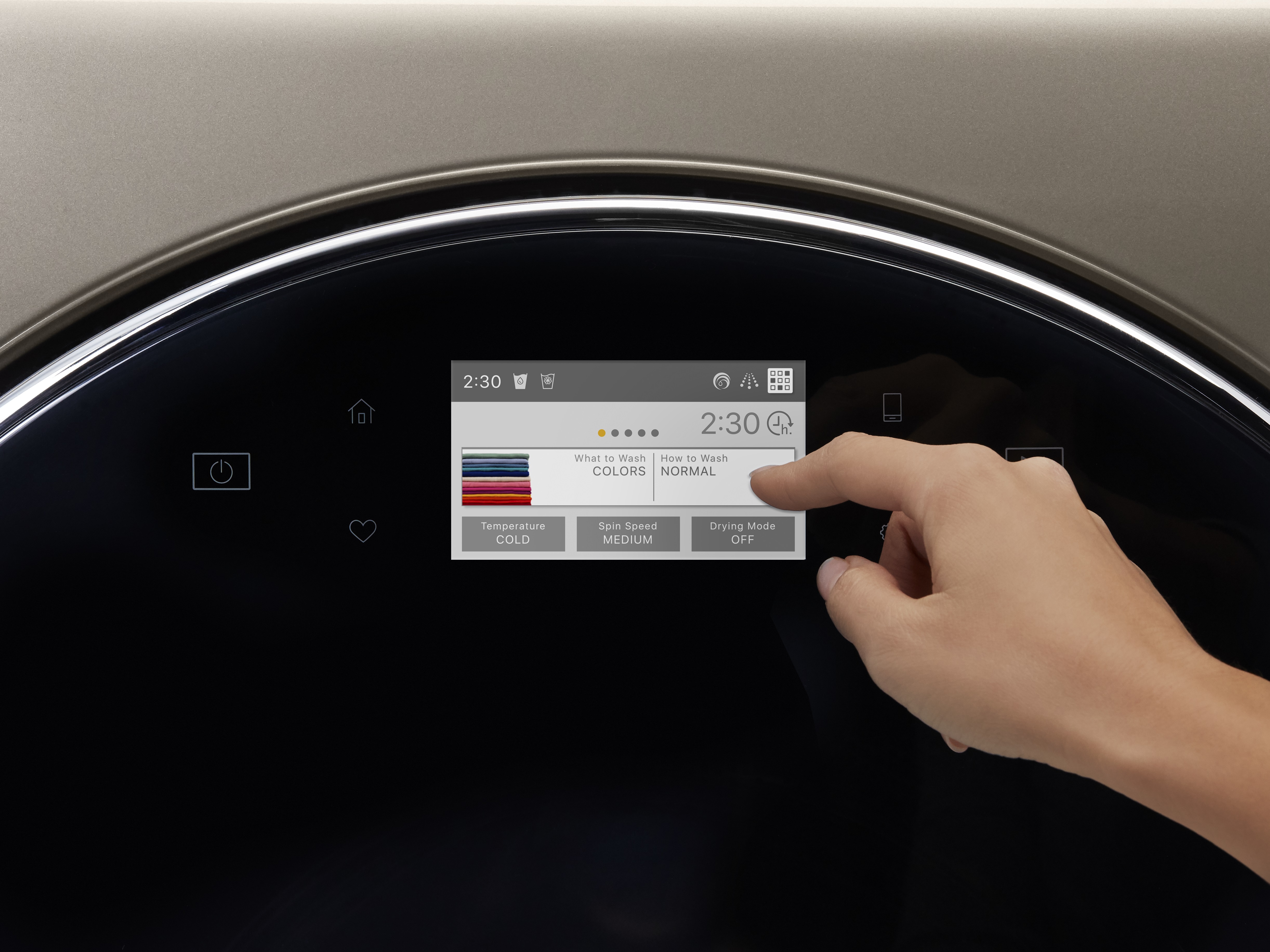 Closeup of person using touchscreen on Whirlpool WFC8090GX washer dryer combo
