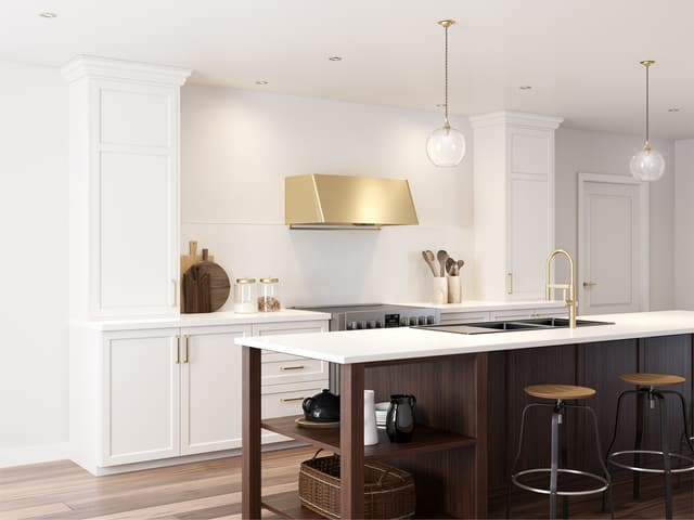 The Zephyr Mesa collection wall mounted range hood in a gold finish