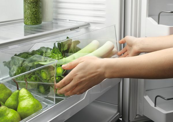 A close-up of produce inside a Fisher & Paykel bin
