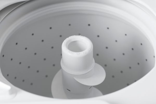 A close-up of an agitator on a top load washer  