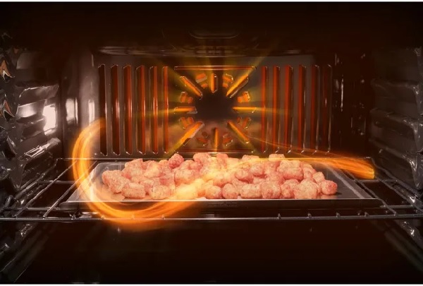 Tater tots baking inside the GE Profile PTD7000SNSS double wall oven 
