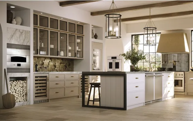 The Monogram ZDWI240HII wine fridge with a matching fridge in a high-end kitchen