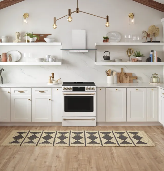The Café CHS900P4MW2-CL induction range in a modern kitchen