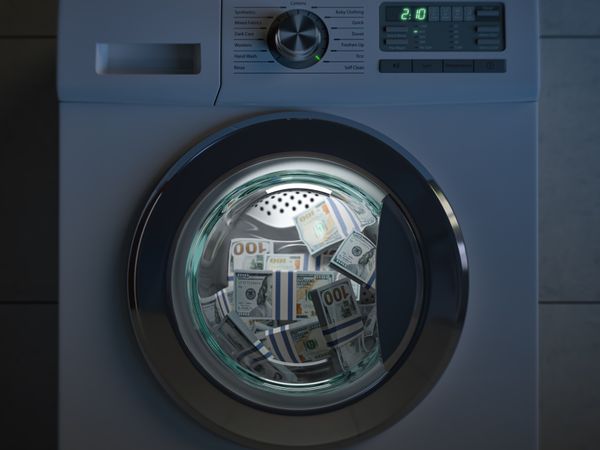 A front load washer with bundles of $100 inside 