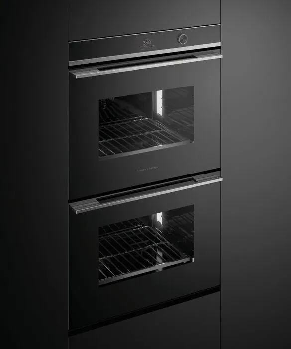 A dramatic shot of the Fisher & Paykel Series 9 OB30DDPTDX2 double wall oven 