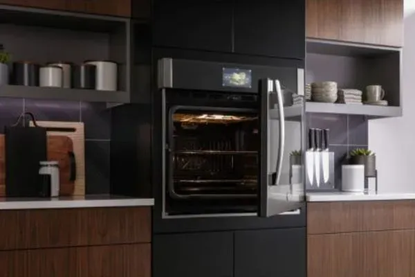 The GE Profile PTS700RSNSS oven featured in a kitchen 