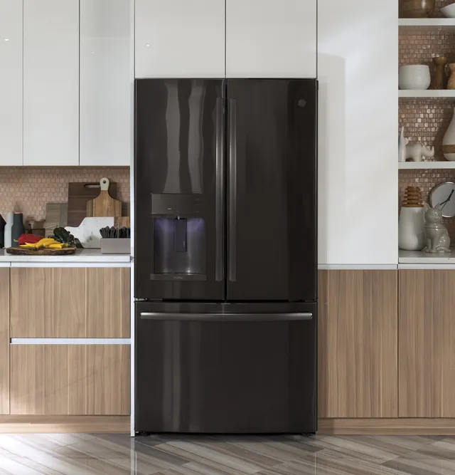 The GE Profile PYE22KBLTS black stainless French door refrigerator in a kitchen