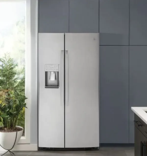 A GE Profile counter depth refrigerator in a kitchen 