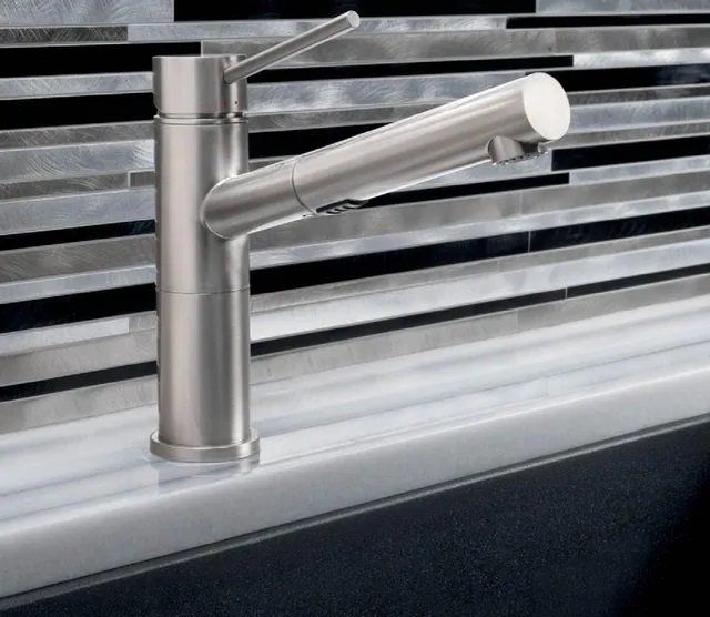 Blanco 441493 kitchen faucet shown against multi-color blue backsplash