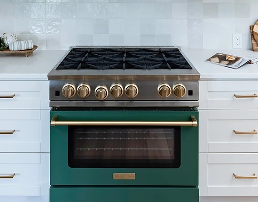 A BlueStar 36” gas range in a custom green finish 