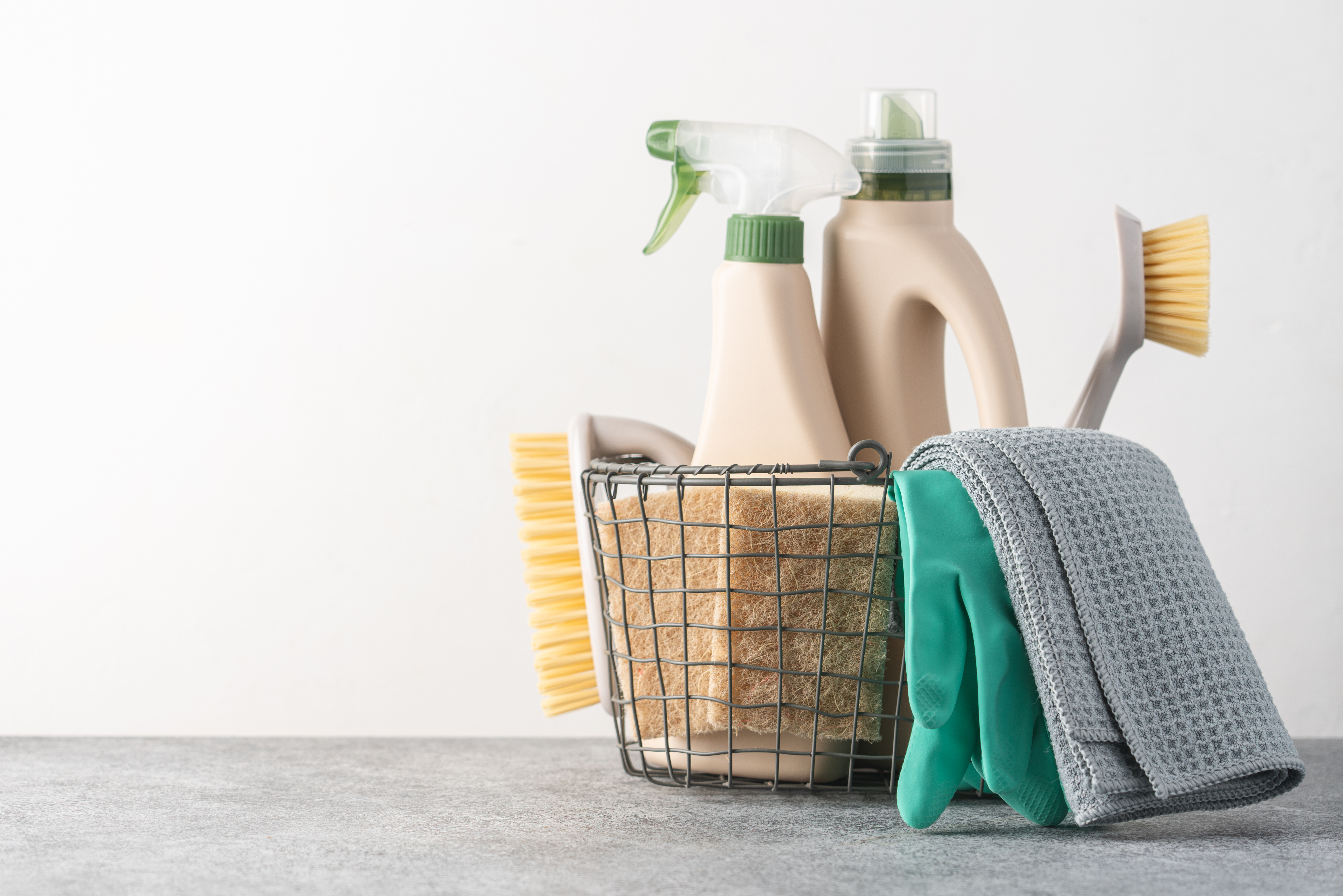 A basket of cleaning supplies 