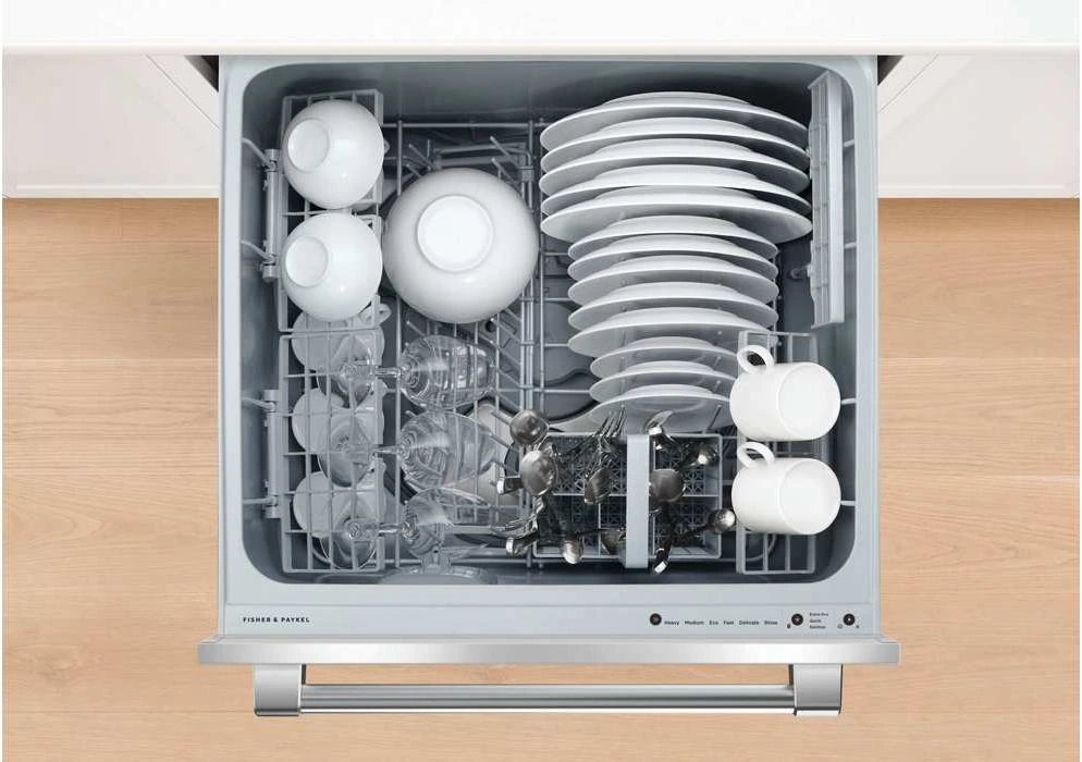 Overhead look at a Fisher & Paykel drawer dishwasher loaded with dinnerware 