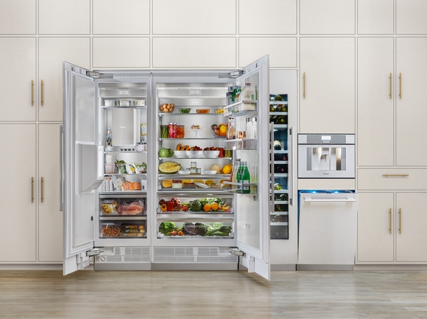 A Thermador freezerless refrigerator and column freezer in a kitchen 