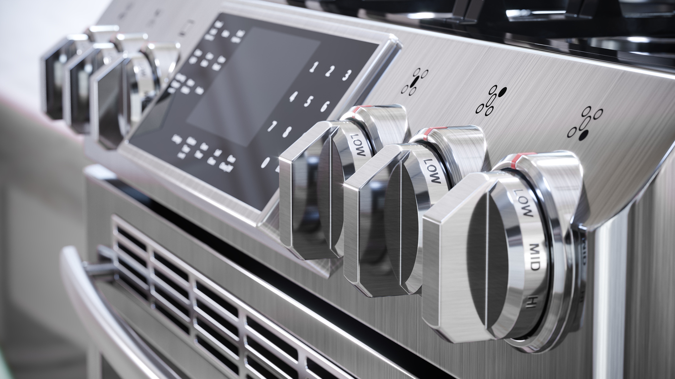 editorial of knobs and screen display on stainless steel gas range