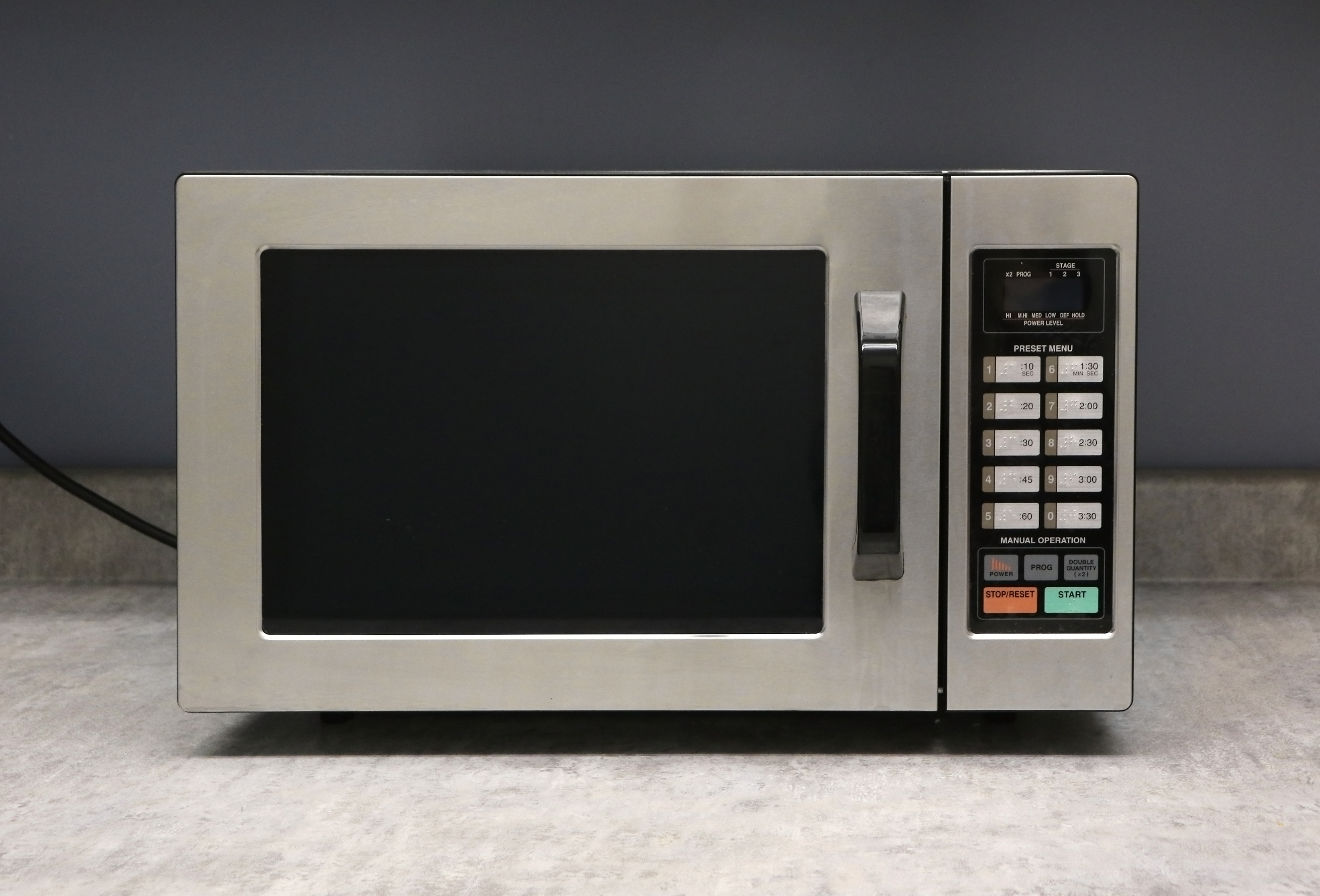A close up of a countertop microwave 