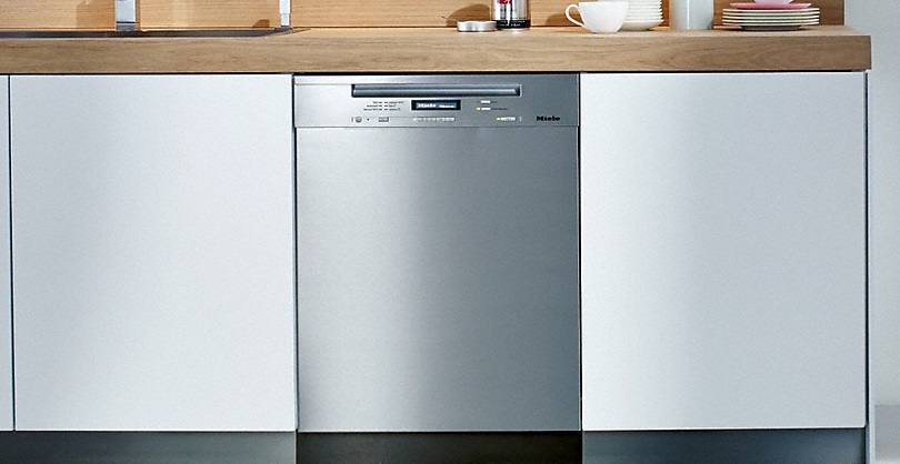 Head shot of modern kitchen featuring Miele dishwasher