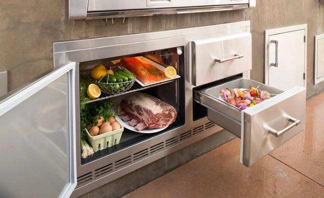 Alt. text: The Alfresco ALXE ARXE-42 under grill refrigerator with various food items  Pimcore: Credit: Alfreso