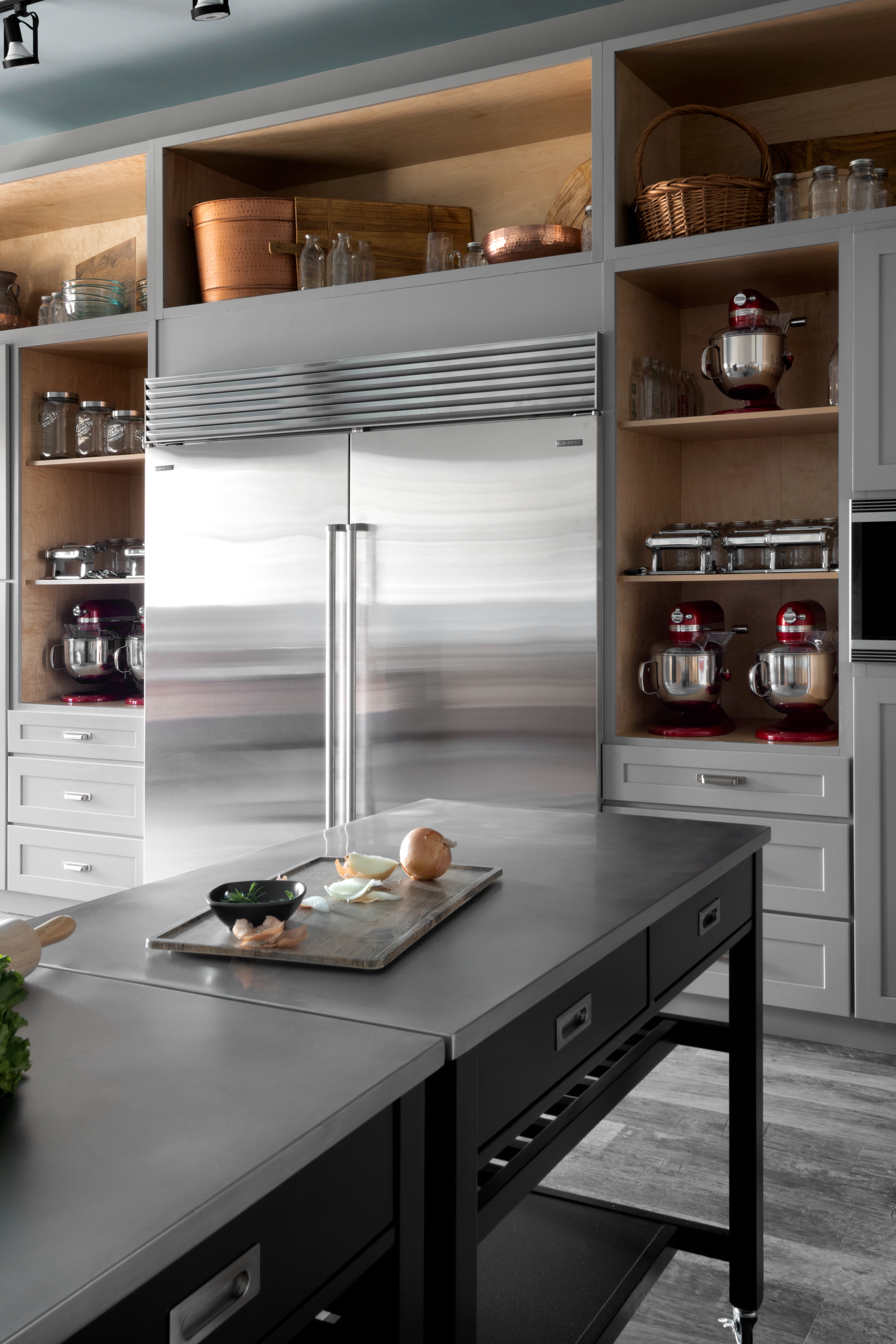 contemporary kitchen highlighting sub-zero built in side by side refrigerator