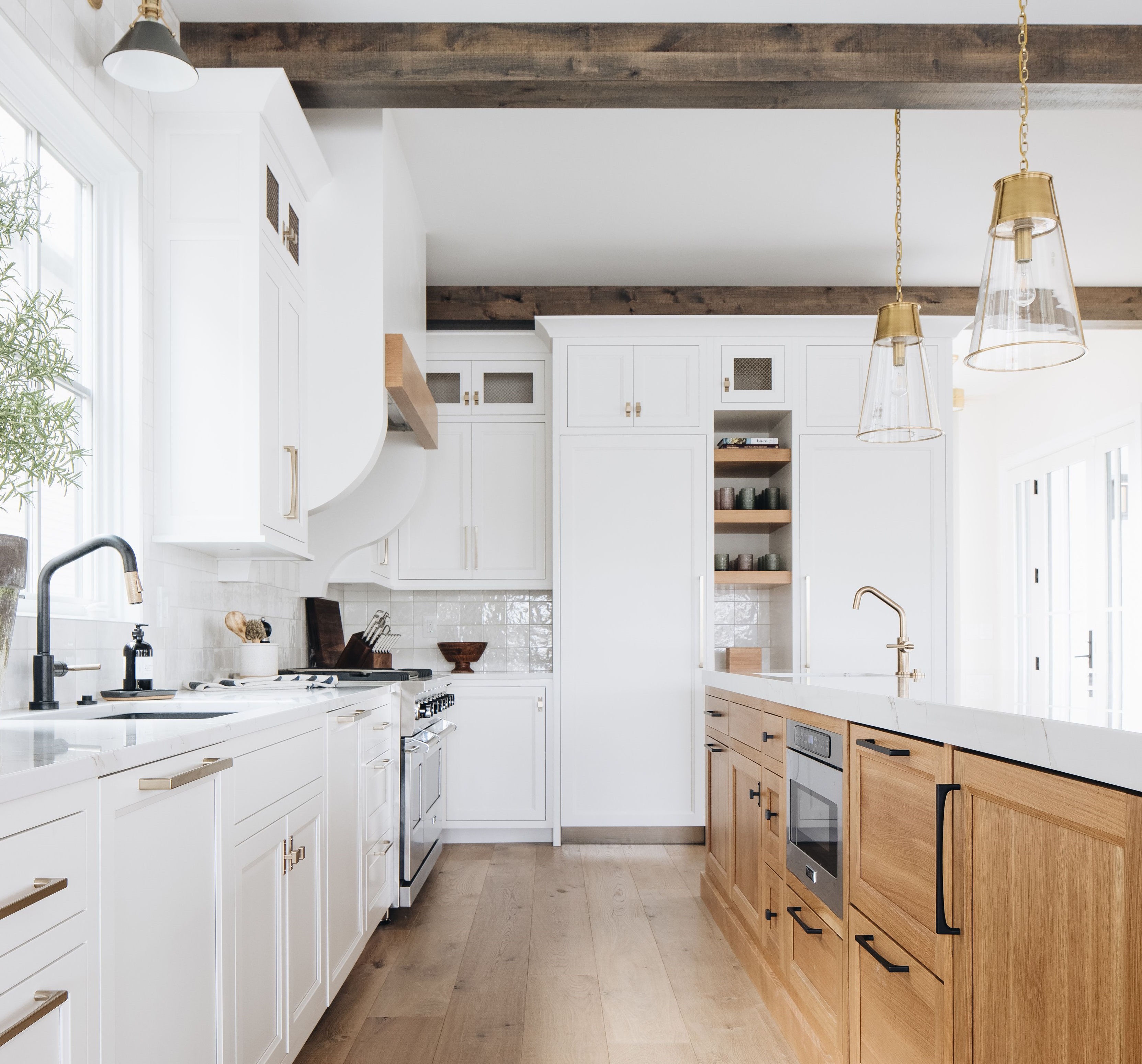 A kitchen design by Beth Howley featuring a Viking built-in panel-ready refrigerator