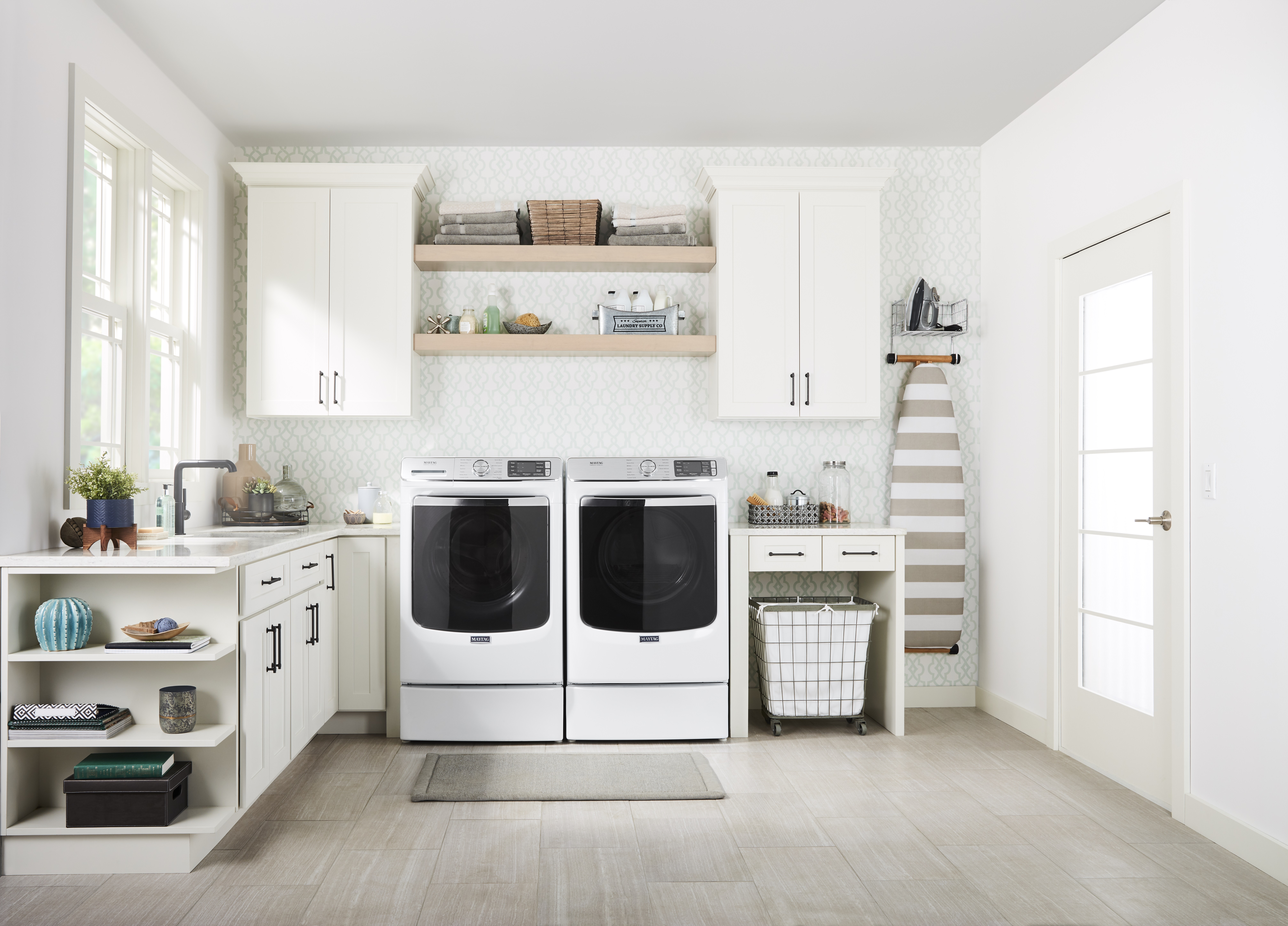 contemporary white laundry room with whirlpool p180225 and p180225 washer and dryer