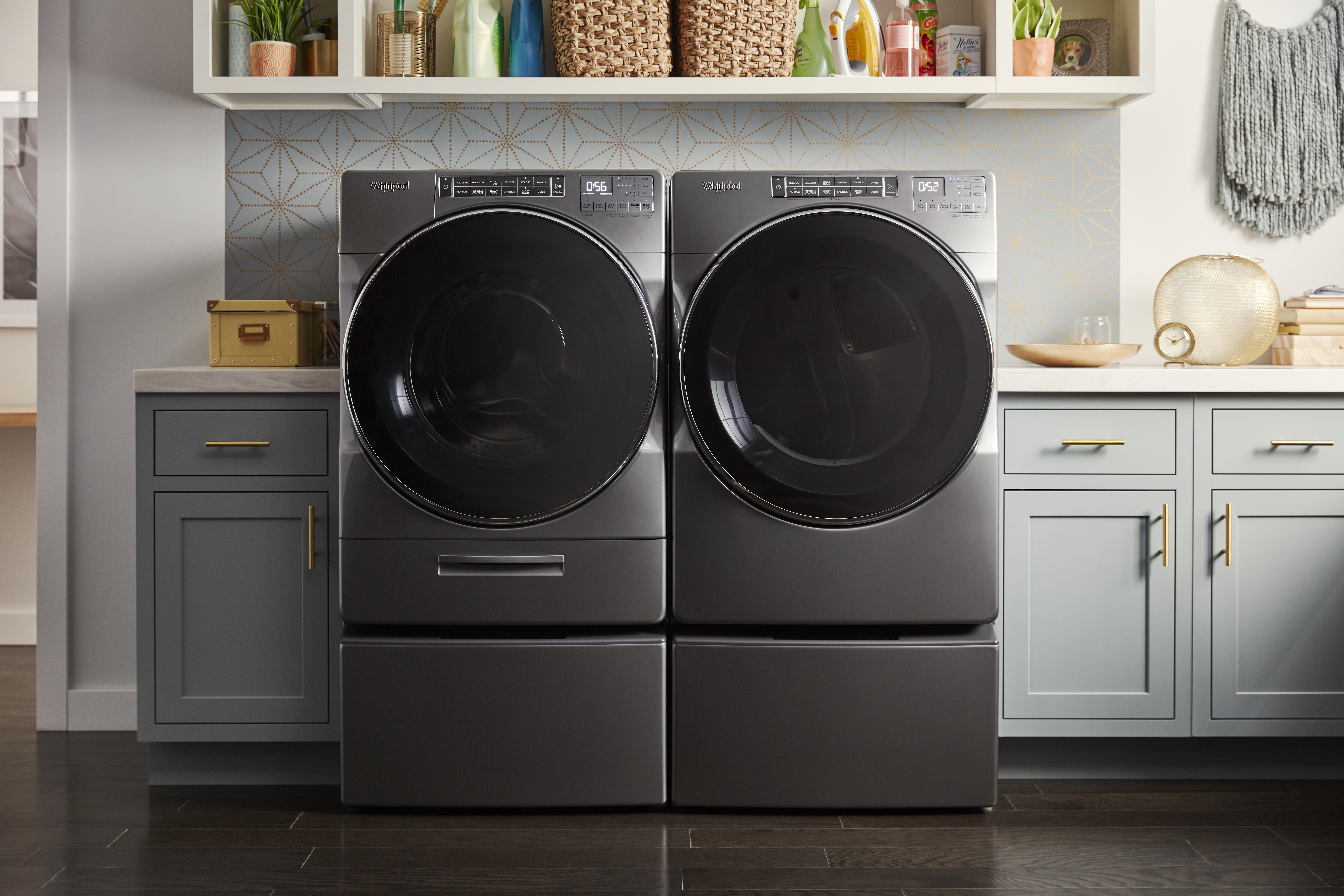 a whirlpool front load washer and dryer set in a modern laundry room