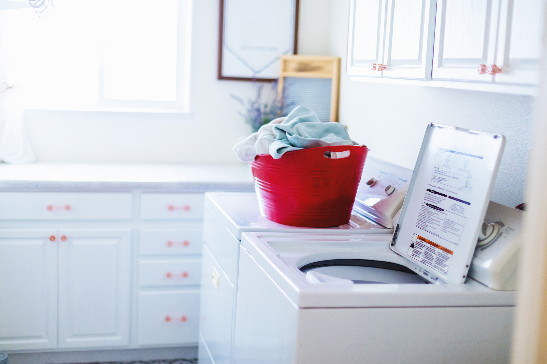 all-white laundry room